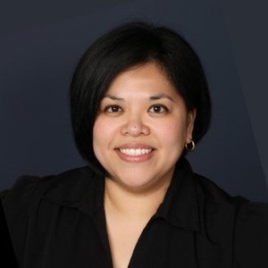 Image of a woman in business clothes.