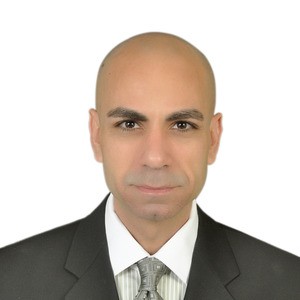 Portait of man in business attire.