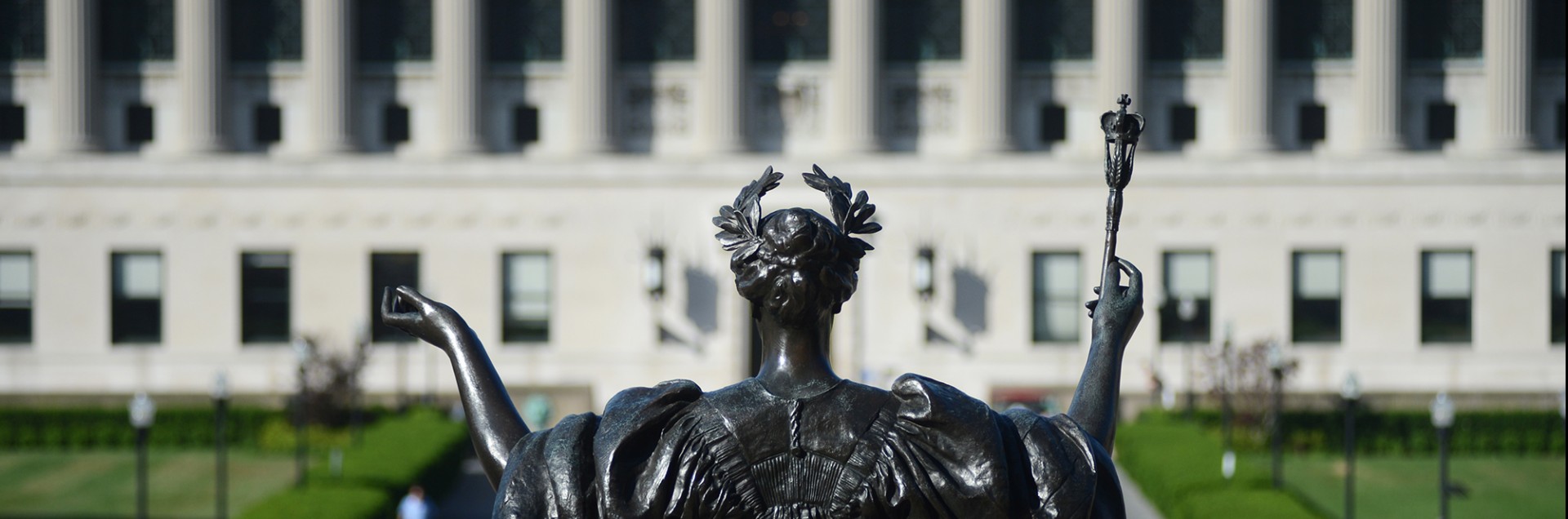 The Alma statue facing Butler Library.